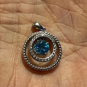 Sterling blue topaz and diamond pendant.